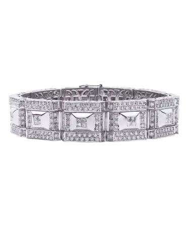 Pulsera con Diamantes blancos en Oro blanco de 18 Quilates. Disponible en VIRTU LUXURY.
