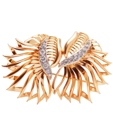 Este broche ALAS DE ÁNGEL es cautivador gracias a su forma incomparable y sus diamantes centelleantes.