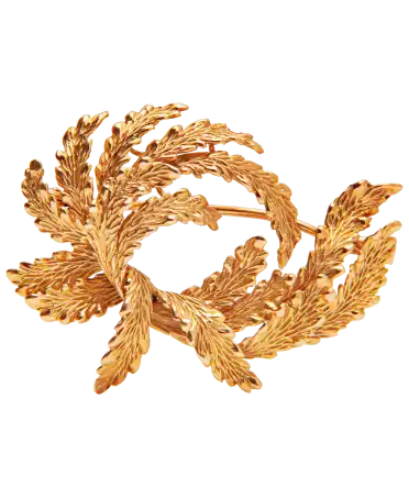 El broche Laureles Victoriosos es una joya refinada, que se distingue por sus cuidados detalles y su elegancia atemporal.