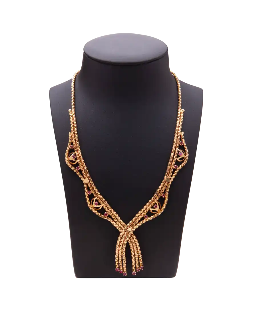 Collar de Rubíes Art Déco en oro amarillo de 18 quilates con diseño de fantasía. Disponible en VIRTU LUXURY.