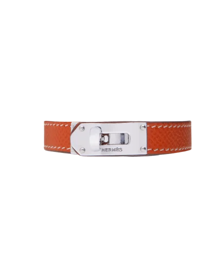 Brazalete de la casa de lujo Hermès en Acero y Cuero naranja. Disponible en VIRTU LUXURY.